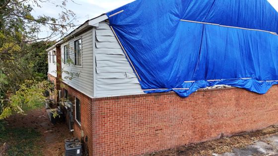 Storm-Damaged Roof — Tarped